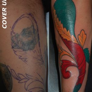 Coperrtura di un vecchio tatuaggio con un asso di bastoni